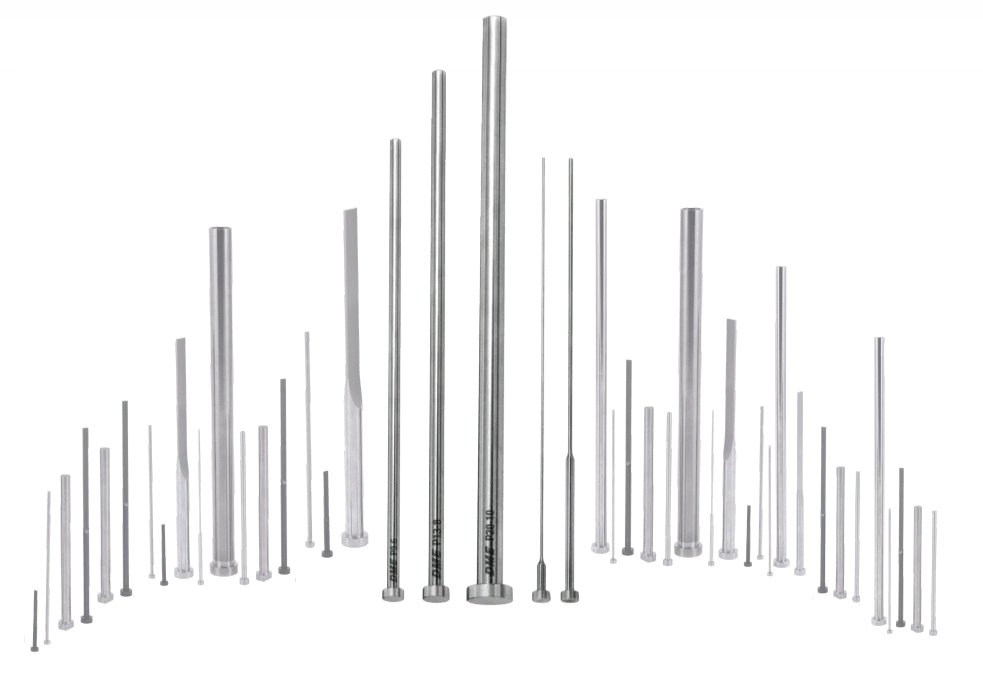 DME photograph of actual straight and shoulder ejector pins and ejector blades with their retaining heads